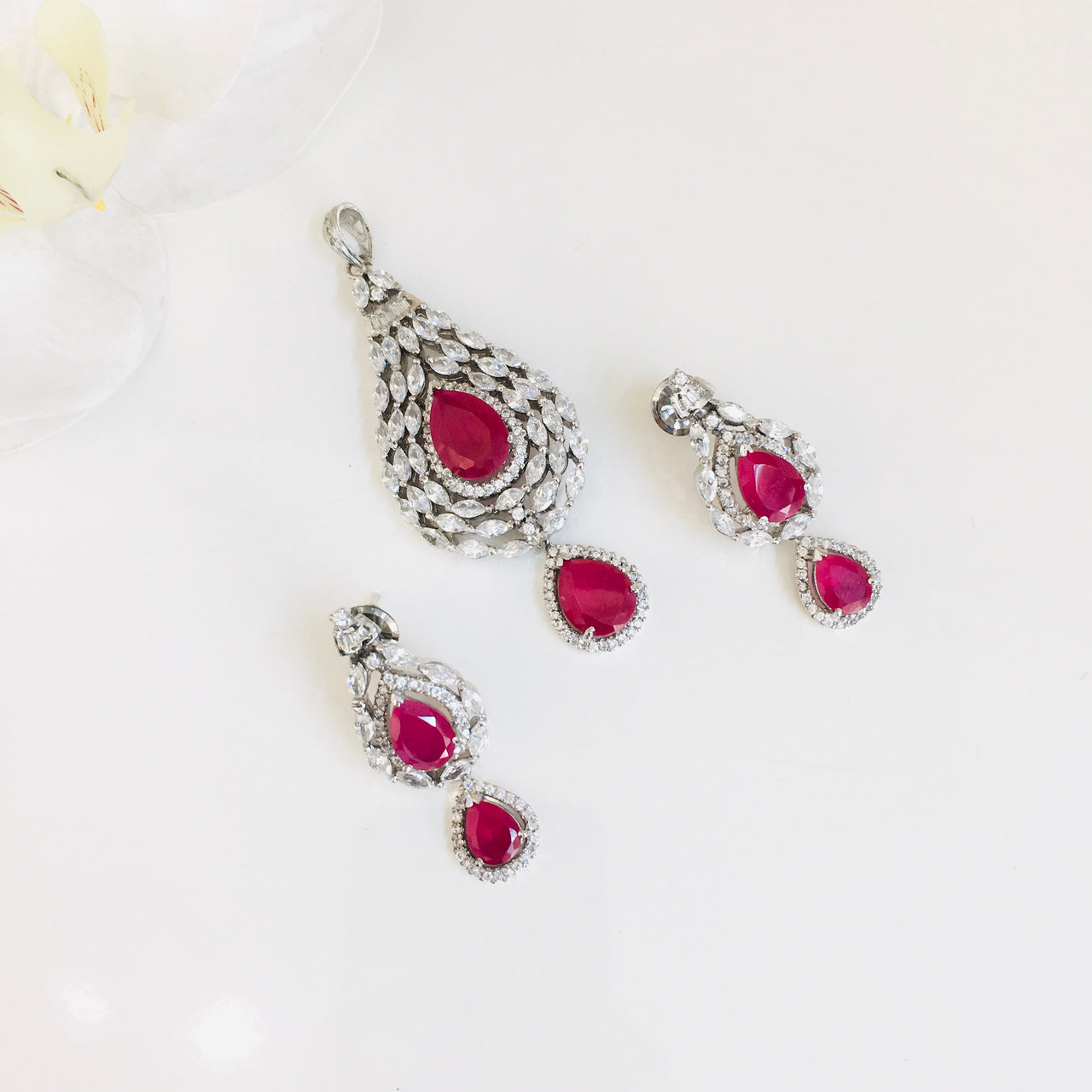 14K White Gold Round Ruby and Diamond Halo Stud Earrings - Paul's  Jewelry-Jewelry is Personal.